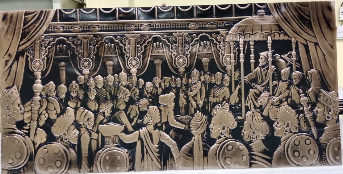 S3 relief mural in a dark metallic finish